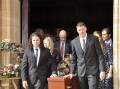 Steve Armstrong's sons, James and Brad, front and daughter, Carlie (right rear) were pallbearers at their father's funeral service at Sts Peter and Paul's Cathedral on Tuesday. Picture by Louise Thrower.
